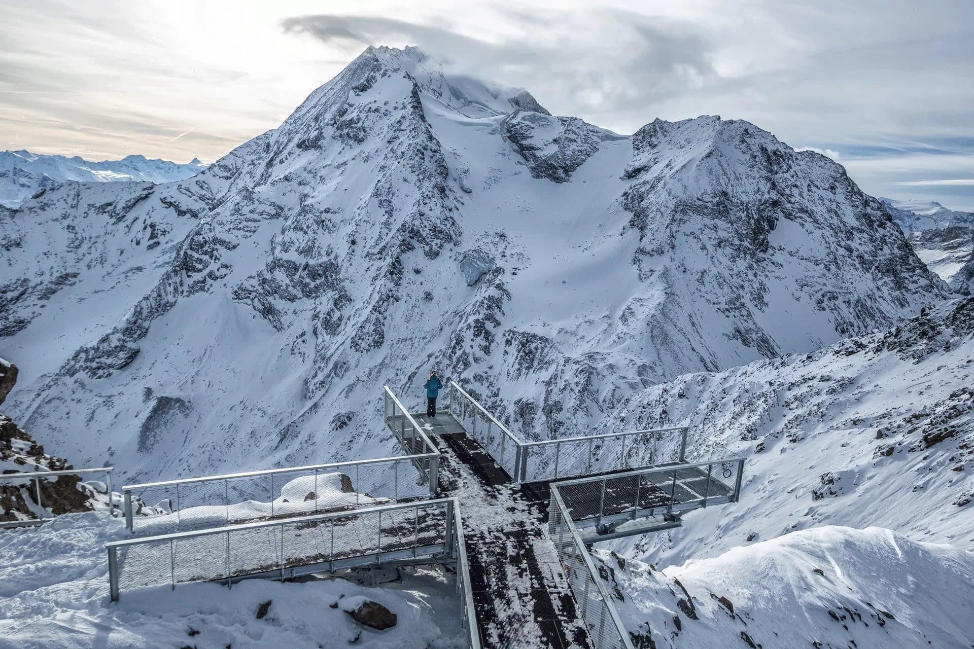Woman overlooking French Alps from viewing platform